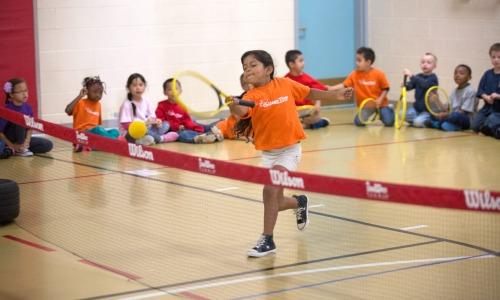 College_View_Elementary_School_Student_Playing_Tennis 